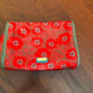 Hadaki women’s cosmetic travel bag over the door